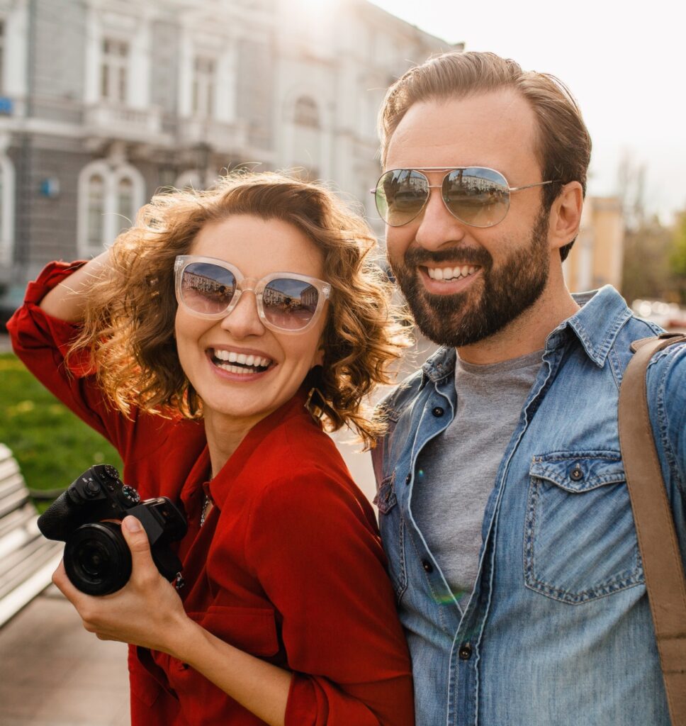 man and woman on romantic vacation walking together
